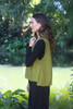Women's pullover vest with an oversized armhole to accommodate wider sleeved blouses.