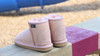 Mid calf short boots for kids, ugg boot design, made of premium sheepskin, pink color.