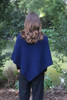 Women's poncho made of possum merino wool in plain classic design and a beautiful purple color.