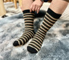 Multi stripe knitted socks made of possum merino wool, made in New Zealand..