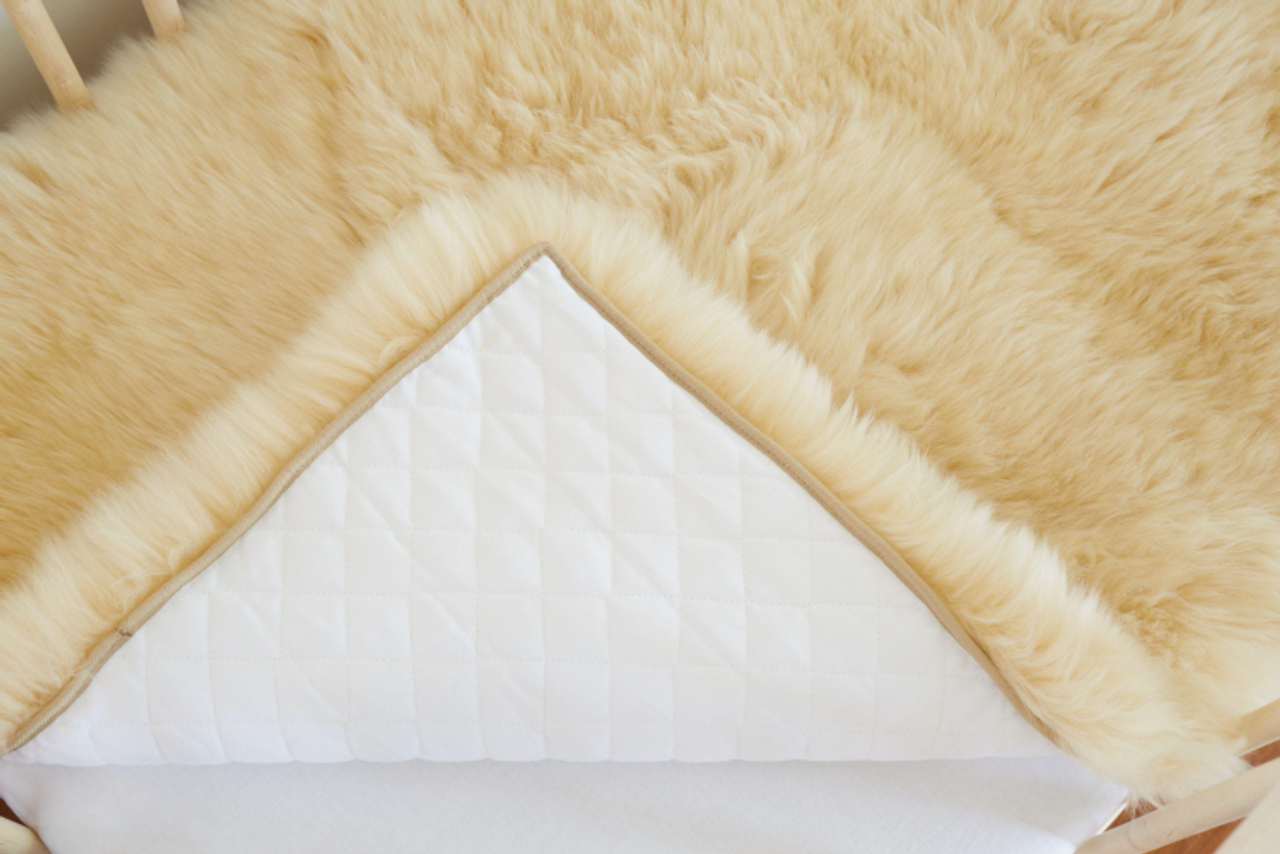 Cot sales lambswool underlay
