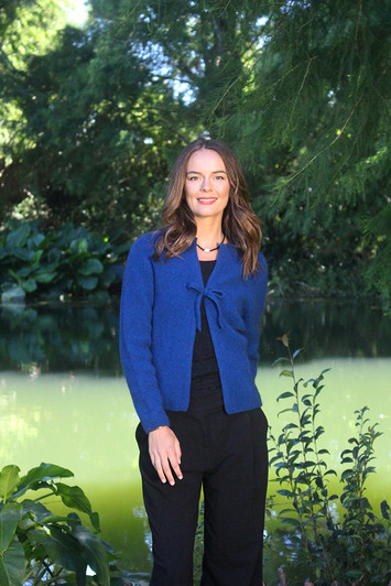 Soft possum merino jacket for women with a central tie which can be tied into a dainty bow, lagoon blue color.