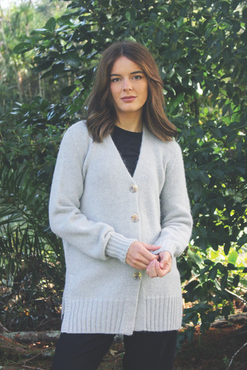 Classic V-neck cardigan made of soft alpaca wool in light dove gray color.