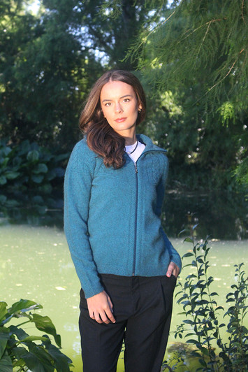Women's possum merino jacket in teal blue color.