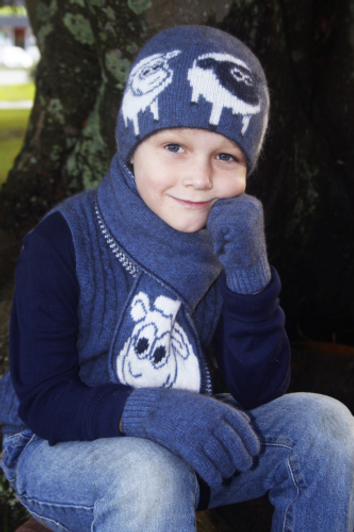 Possum Merino Beanie with a lamb pattern, blue color.