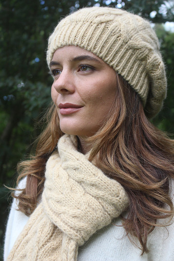 Pure Alpaca Beanie women in chunky cable knit pattern, honey colored. Pure Alpaca Beanie women in chunky cable knit pattern, honey colored.