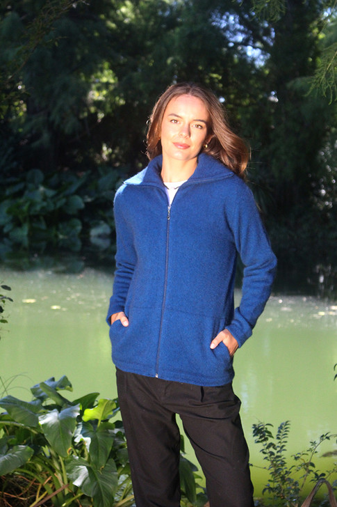 Women's full zip pocket with generous side pockets made of possum merino wool, lagoon blue color.
