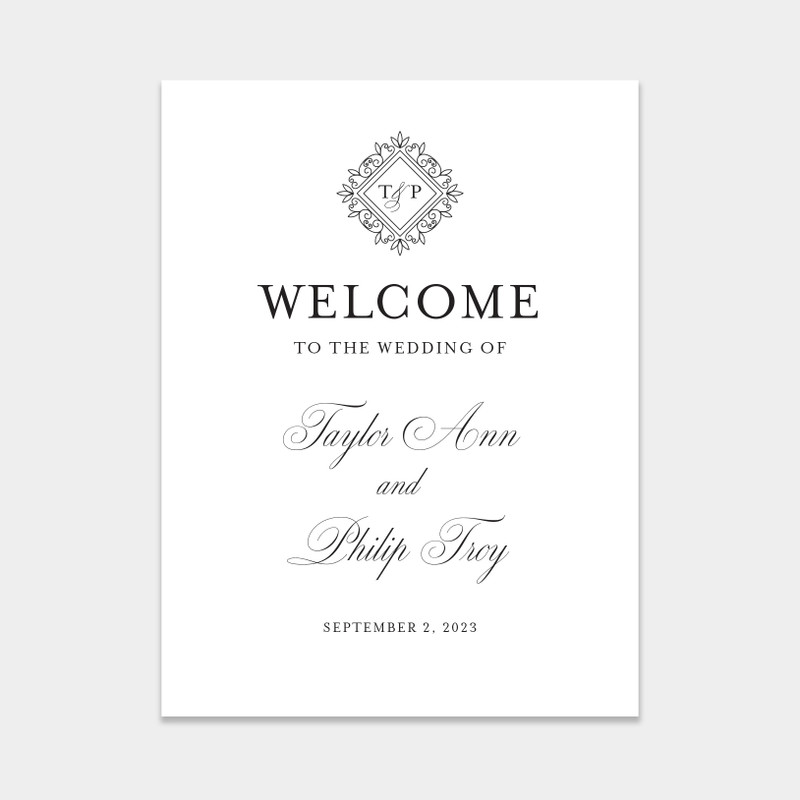 Timeless welcome wedding sign with a classic script font and monogram.