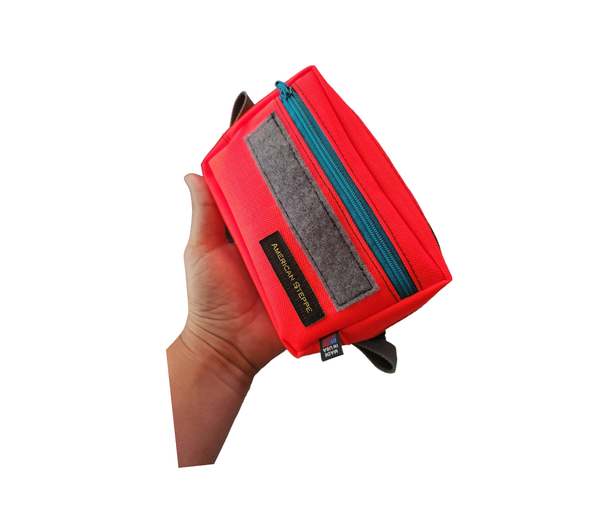 American Steppe Gear blaze orange front pouch accessory.
