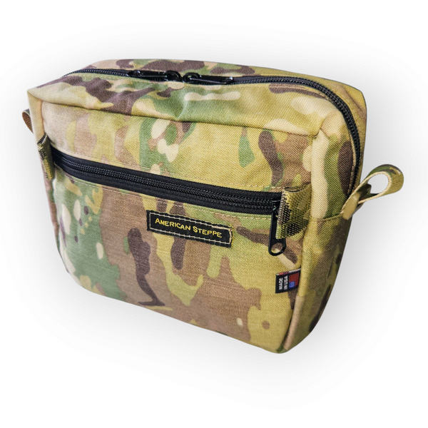 Fanny sling pack in multicam. Low-profile fanny sling pack with MOLLE webbing.