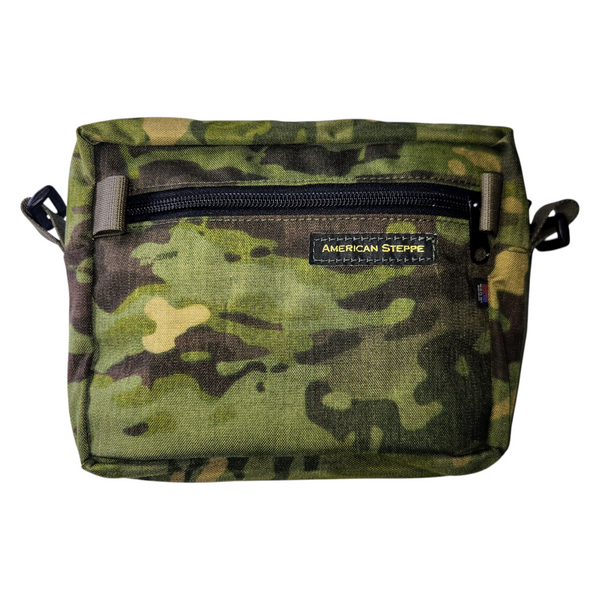 The fanny sling pack in multicam tropic. Tactical sling waist pack with hook-and-loop panels.