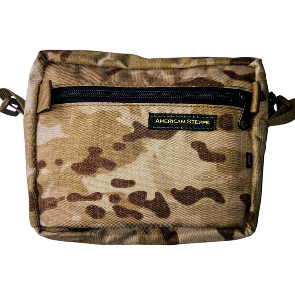 The fanny sling pack in multicam arid. Rugged fanny sling pack for EDC and outdoor use.