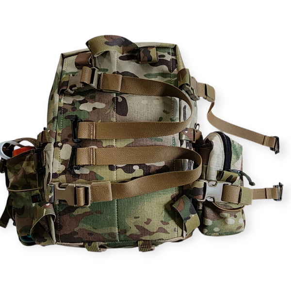 Straps attached to the kids hunting pack back panel loops.