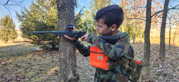 Kids camo chest pack for hunting trips and outdoor adventures.