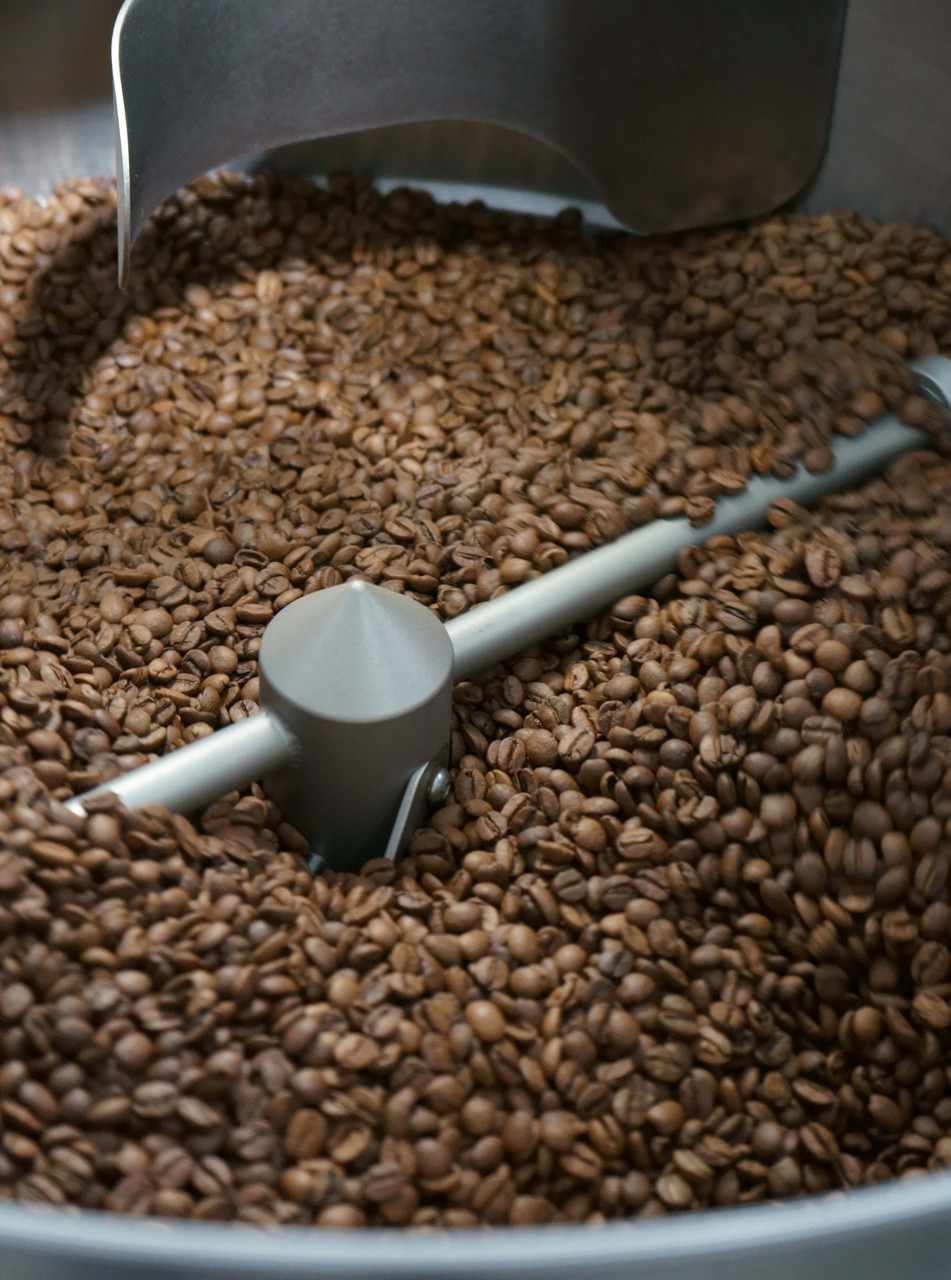 Honduras roasted coffee beans in a roaster