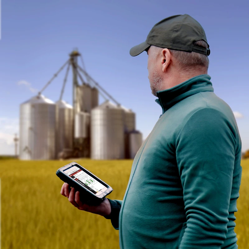 Farmer uses phone to access bin levels through the BinCloud® web app