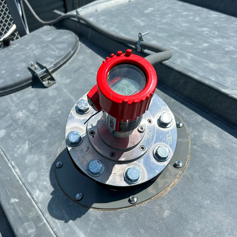 BinMaster's NCR-86 non-contact radar level sensor mounted atop a bin for continuous level monitoring