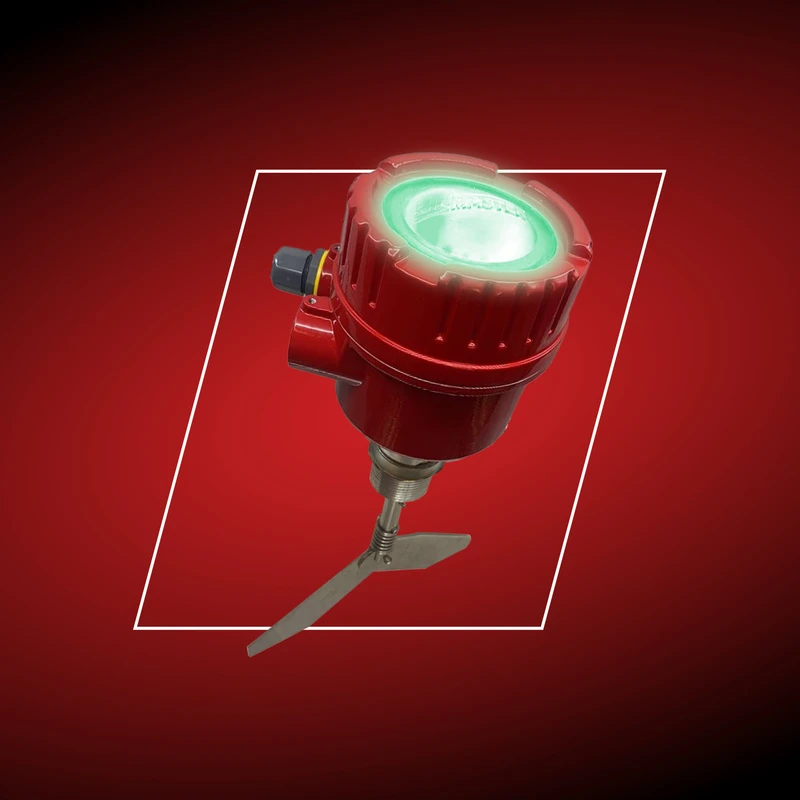 The BMRX-300 rotary sensor's bright status light changes from red to green based on if bulk material is inhibiting paddle rotation