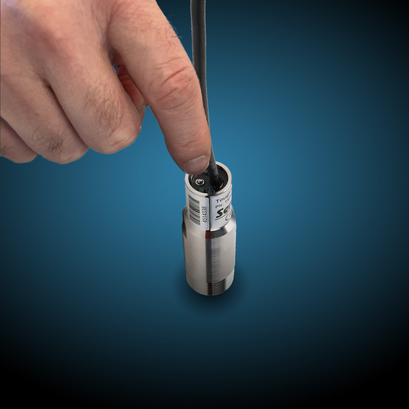 ToughSonic-100 series ultrasonic sensors—excluding the TS-100.50—include a push-button for convenient in-situ setup