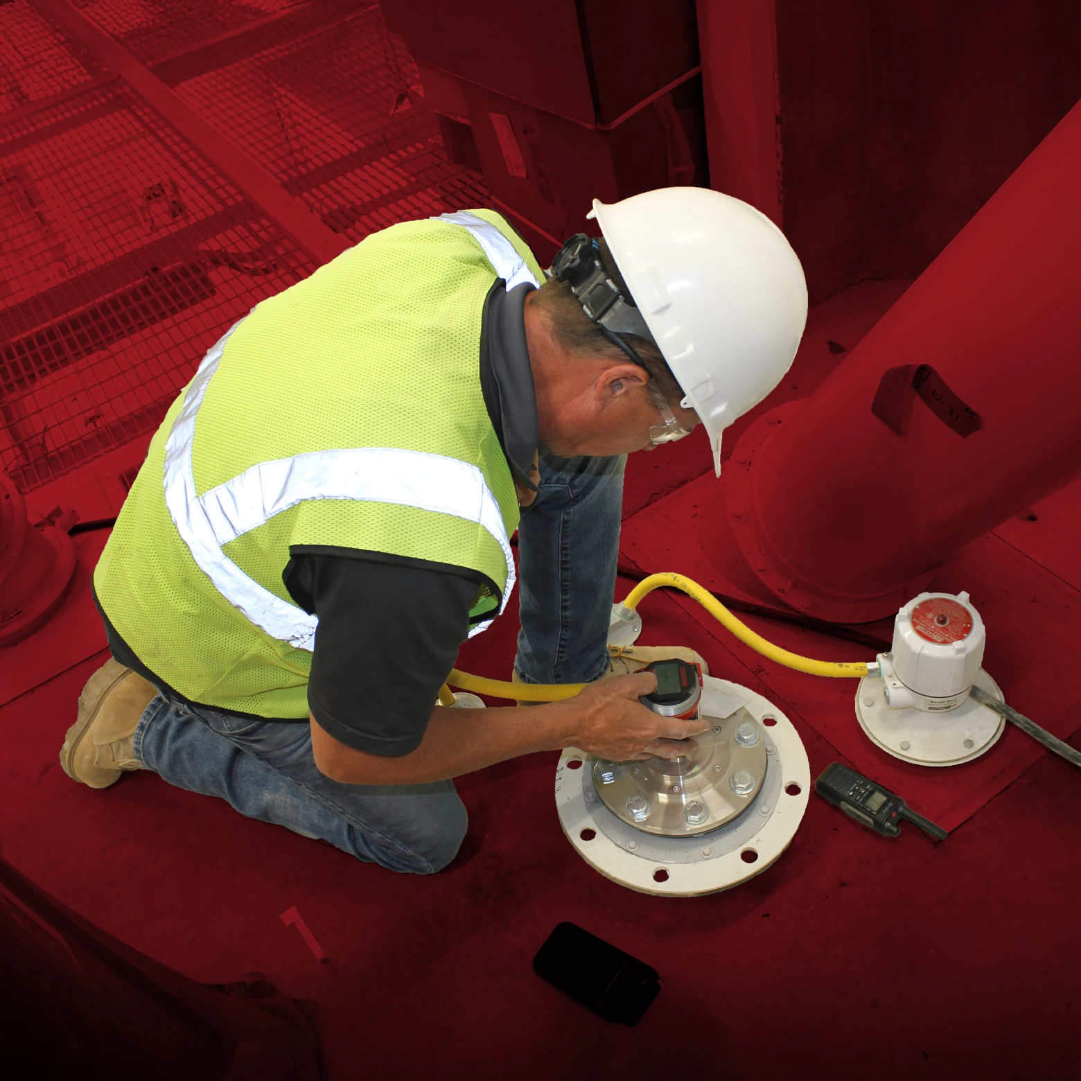 Nathan Grube, BinMaster VP of Sales, configures a radar sensor atop a silo
