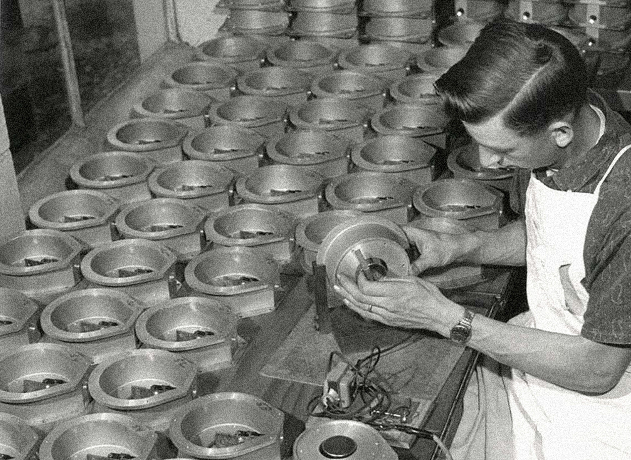 Early days of BinMaster/Garner Industries; assembly line manufactures diaphragm switch pressure sensors by hand