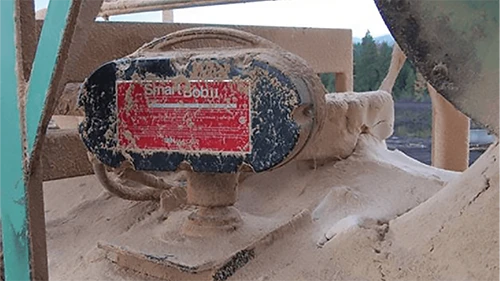 SmartBob mounted at a wood product facility to measure sawdust