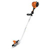Stihl FC 70 lawn edger trimming edges along residential driveway