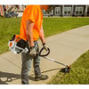 Professional landscaper using Stihl FC 91 lawn edging tool