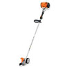 Stihl FC 111 professional lawn edger trimming along sidewalk