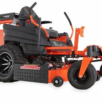 60″ ZT mower fitted with 10 Bushel Dump hopper behind the mower
