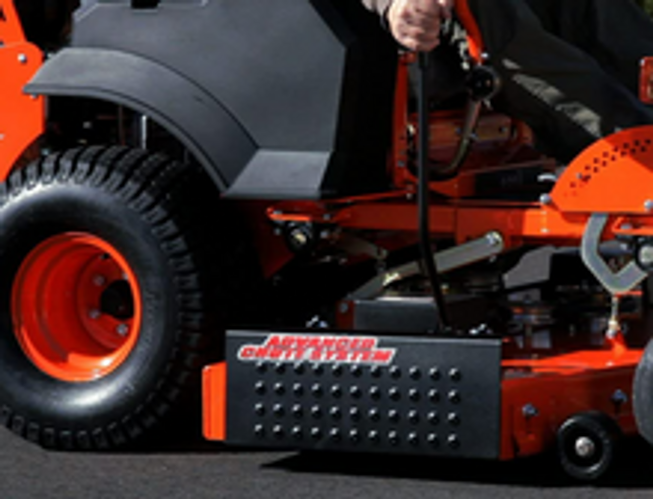 Operator opening ACS6000UBS chute shield to allow normal discharge