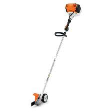 Stihl FC 111 professional lawn edger trimming along sidewalk