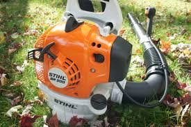Compact Stihl BR 200 backpack blower on driveway cleanup