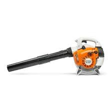 Stihl BG 56 C-E handheld blower clearing leaves from driveway