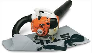 Stihl SH 56 C-E handheld blower mode clearing grass clippings