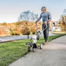 Homeowner using Stihl MM 56 C-E Yard Boss cultivator attachment