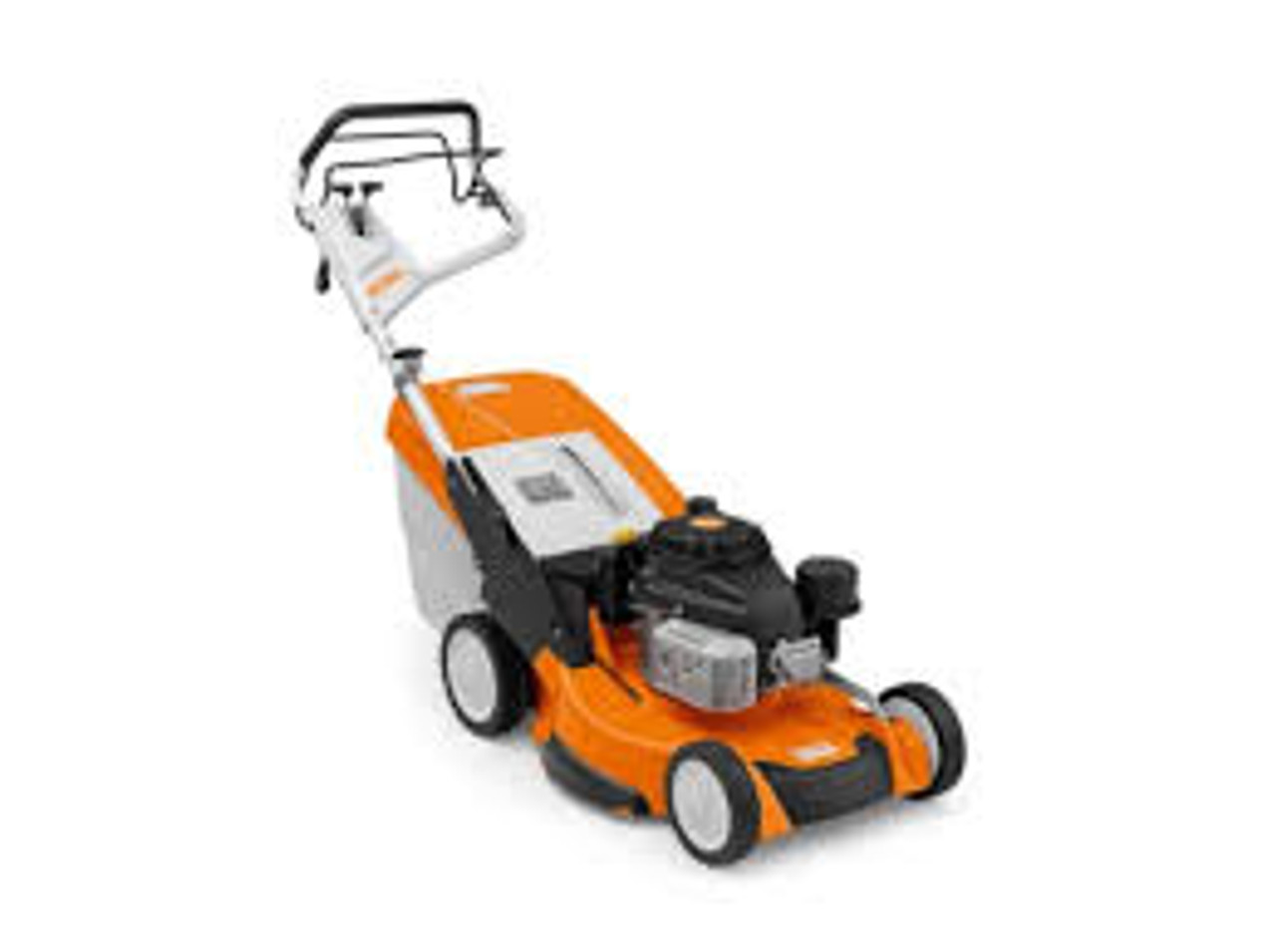 Professional landscaper using Stihl RM 655 YS self-propelled mower on sloped lawn