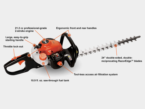 Echo HC-155 hedge trimmer cutting hedge in residential yard Echo HC-155 hedge trimmer cutting hedge in residential yard