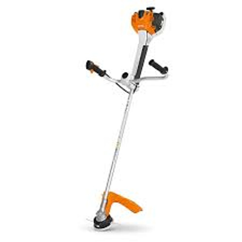 Stihl FS 461 C-EM professional brushcutter clearing heavy brush Stihl FS 461 C-EM professional brushcutter clearing heavy brush