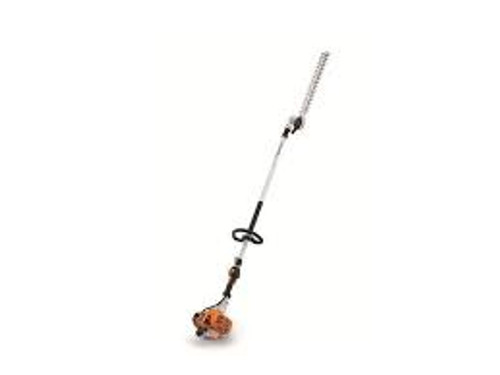 Stihl HL 94 K 145-degree hedge trimmer cutting tall hedge tops Stihl HL 94 K 145-degree hedge trimmer cutting tall hedge tops