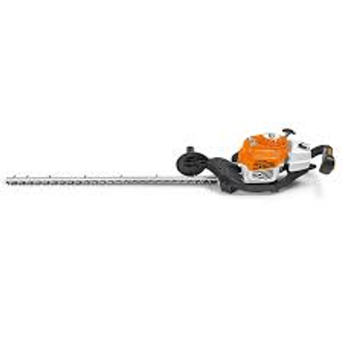 Professional landscaper trimming tall hedge with Stihl HS 87 T 40"