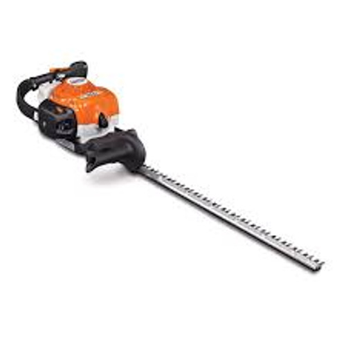 Professional landscaper using Stihl HS 87 R 30" for precise trimming