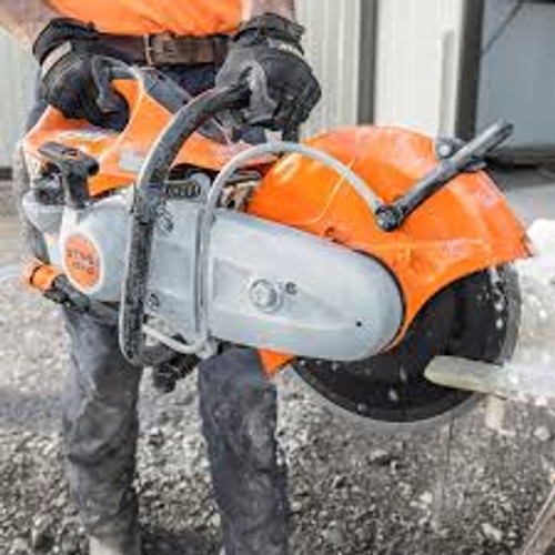 Professional contractor using Stihl TS 410 on masonry