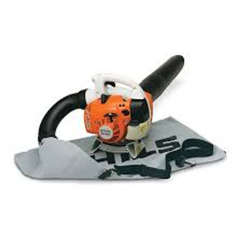 Homeowner using Stihl SH 56 C-E as a handheld blower for yard cleanup