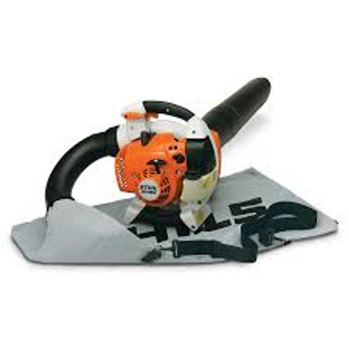 Stihl SH 86 C-E shredder vac mulching leaves in backyard Stihl SH 86 C-E shredder vac mulching leaves in backyard