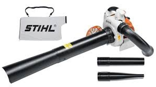 Landscaper using Stihl SH 86 C-E as a powerful handheld blower Landscaper using Stihl SH 86 C-E as a powerful handheld blower