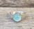 Flower Aqua Chalcedony Round Solitaire Ring in Sterling Silver Scallop Bezel