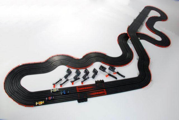 AFX Super International assembled track layout with four Mega-G+ H0 slot cars, four hand controllers and two AFX Tri-Power packs