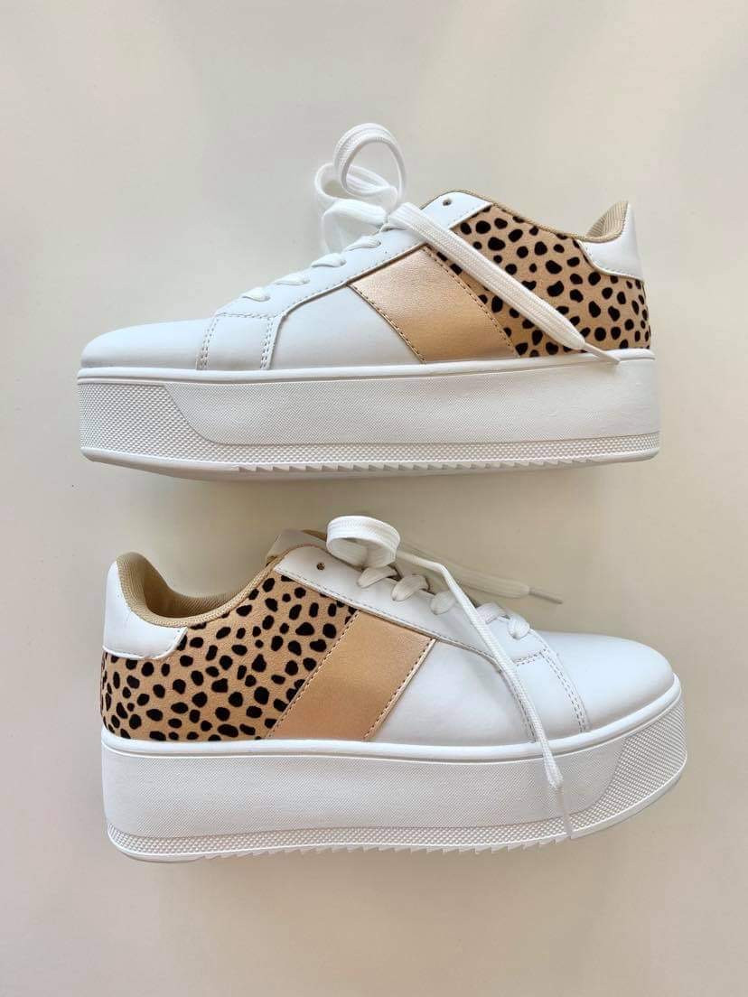 white platform tennis