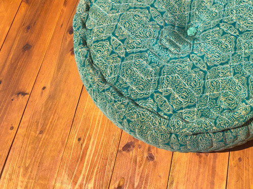 https://cdn11.bigcommerce.com/s-ndgwf6iffo/images/stencil/500x659/products/2392/9921/ottoman-round-boho-chic-quilted-silk-floor-cushion-pillow-pouf-in-turquoise-teal__59323.1660816295.jpg?c=2